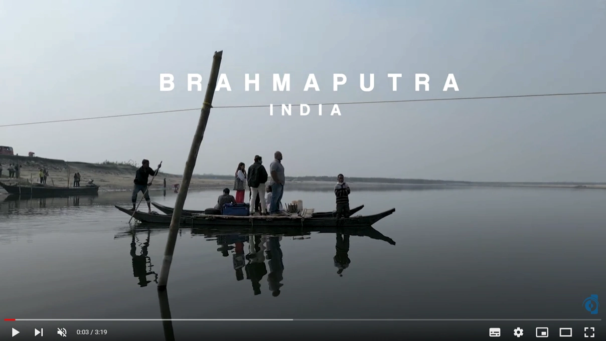 A young woman hugs an older woman